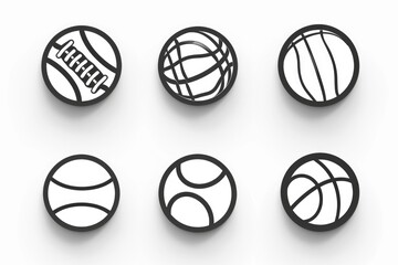 Canvas Print - Four black and white sports balls on a surface, used in various games or competitions