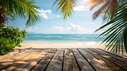 Wall Mural - empty wooden table on beach with palm leaves background