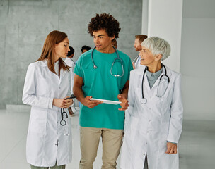 Wall Mural - doctor hospital team medical nurse health medicine healthcare meeting teamwork tablet computer technology clinic office