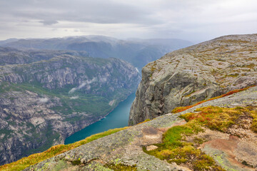 Wall Mural - Norway Kjerag plateau view on a cloudy summer day