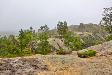 Wall Mural - Norway landscape on a cloudy summer day