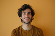 © MagnusCort - A close up portrait of a young man with a subtle smile