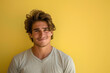 © MagnusCort - A close up portrait of a young man with a subtle smile