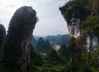 Wall Mural - The natural scenery of karst mountain peaks in Xingping Town