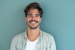 © MagnusCort - A close up portrait of a young man with a subtle smile