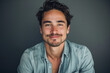 © MagnusCort - A close up portrait of a young man with a subtle smile