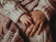 © mirifadapt - beautiful young female hands gently touching baby skin, close-up, concept of love mother and child