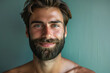 © MagnusCort - A close up portrait of a young man with a subtle smile