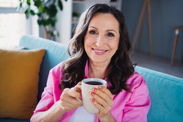 Sticker - Photo of lovely cute senior woman enjoying weekend vacation drinking fresh hot tea comfy indoors