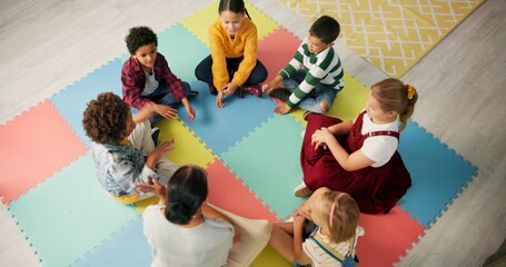 kindergarten, children and hands with game in circle for development, growth and activity. teacher, 