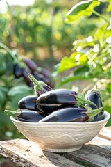 Wall Mural - eggplant in a bowl in a white bowl on a wooden table. Selective focus