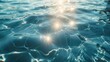 © Alexander Beker - The pool water background exudes summer vibes with sunlight reflections, sparkling ripples, and a textured swimming pool surface