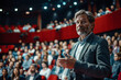 © Mihai Zaharia - CEO Giving Business Presentation to Large Audience