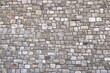 © Dynamoland - Gray natural stone wall background