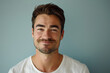 © MagnusCort - A close up portrait of a young man with a subtle smile