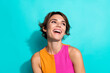 © deagreez - Photo of dreamy positive woman wear pink orange top laughing looking empty space isolated teal color background