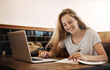 © Lyndon/peopleimages.com - Woman, smile and study at cafe with laptop as university student for elearning or online education. Female learner, happy and satisfied with writing or revision and research for college exams