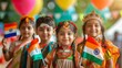 © Pavel Kachanau - Four children hold Indian flags during a celebration