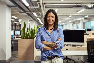 Wall Mural - Office, smile and businesswoman in portrait with arms crossed, confidence and person in workplace. About us, pride and startup company with happy entrepreneur for empowerment in career or profession.