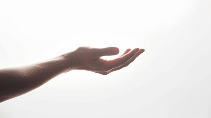 mysterious hand holding an unknown object cut out on a white background evoking curiosity and intrigue conceptual photography