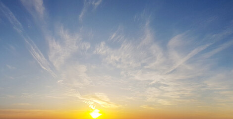 Wall Mural - panorama of blue sky with white clouds and golden sun, nature weather background