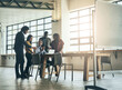 © Lyndon/peopleimages.com - Business people, meeting and teamwork with laptop together for performance improvement, mentorship and training. Manager, group and online for learning system or coaching, skills and guidance