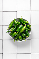 Wall Mural - Fresh green Spanish Pimientos de Padron pepper, top view
