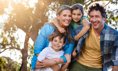 Wall Mural - Portrait, family and hug in embrace for support, development and growth in outdoor or backyard. Woman, man and kids with comfort, child care and parenthood in bonding, relationship and connection