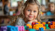 © PhotoFed - Pre-school children assemble colored construction sets.