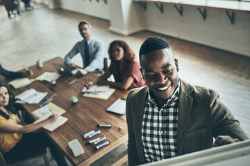 Board, leader or black man in presentation for teaching, SWOT analysis or skill development in meeting. People, business workshop or speaker talking in team training, coaching or learning opportunity