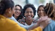 © Summit Art Creations - A group of diverse women are smiling and embracing each other, showing their support and unity. AIG535