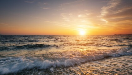 a vibrant ocean scene at sunset capturing the warm glow of the sun over the rippling water and the gentle transition from day to night
