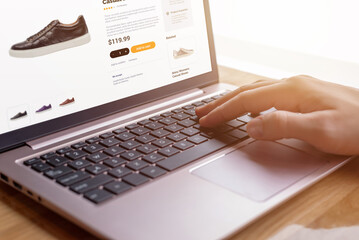Poster - Hands on keyboard searching for modern shoes. E-commerce interface concept. Seamless digital shopping experience for shoe enthusiasts