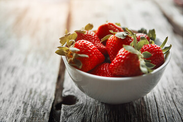 Sticker - Strawberry, bowl and table with food and fruit salad for wellness, nutrition and to lose weight. Home, breakfast and sustainable meal or health snack with vitamin A and diet dessert for eating