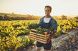© Lyndon/peopleimages.com - Farming, harvest and portrait of man with box for vegetables, production and growth in nature. Happy, farmer and container with organic produce for small business, agriculture and sustainability