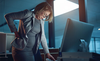 Woman, office and computer in working late with reading for deadline as project manager in web agency. Female person, business and workplace on tech for planning, ideas as professional for company