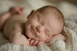 © InfiniteStudio - Newborn sleeping, smiling in sleep