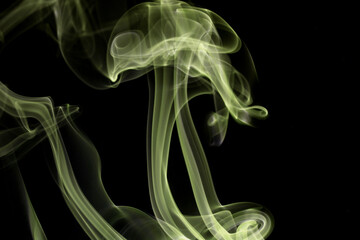 Wall Mural - close up of incense smoke abstract on black background