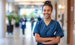 © piai - A happy medical woman nurse stands in hospital