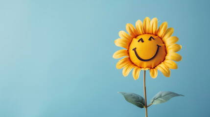 Wall Mural - Smiling sunflower doll on blue background.