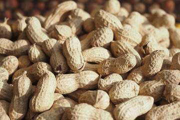 Canvas Print - top view of Several peanuts in a basket.
