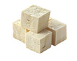© narak0rn - Top view of five tofu cubes stacked in a pyramid formation against a white background, highlighting texture and freshness of the tofu cubes.