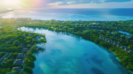 Canvas Print - Aerial view of the beautiful resort lagoon waters surrounded by garden trees.