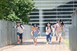 © kapinon - Full body of Japanese elementary school students running and dashing with school bags on their backs Images of future, hope, and energy