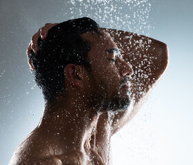 Canvas Print - Man, shower and washing in studio for hair, cosmetics and cleaning on gray background. Male person, profile and water drops for conditioner treatment or dermatology, grooming and hydration beauty