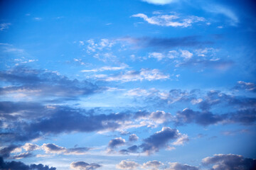 Wall Mural - view of the blue sky at sunset with pink clouds