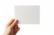 © dendyh7 - Blank paper mockup on hand created with generative AI