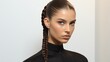© Oranee  - A sleek high ponytail with a braided base