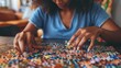 © wpw - Women do leisurely activities like solving puzzles or playing board games. To relax and have fun
