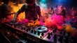 © anwel - Dynamic dj hands on mixer and turntables with colorful light trails in close up action shot